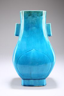 A CHINESE TURQUOISE GLAZED VASE, 19TH/20TH CENTURY, with tw
