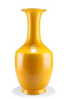 A LARGE CHINESE OCHRE GLAZED PORCELAIN VASE, bottle shaped,