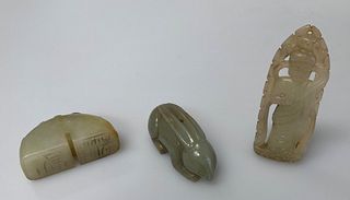 A GROUP OF THREE CHINESE JADE CARVINGS, comprising 'bat' se