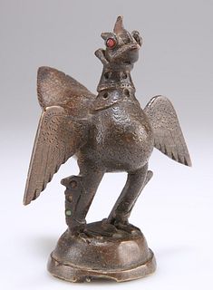 A SMALL BRONZE OF A PHOENIX, cast with wings outstretched, 