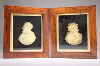 A PAIR OF EARLY 19TH CENTURY WAX PROFILE PORTRAITS, facing 