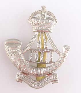 AN OTHER RANKS' PATTERN POST-1908 CAP BADGE, of the Durham 