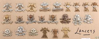 A COLLECTION OF CAP BADGES, COLLAR BADGES AND ARM BADGES, o