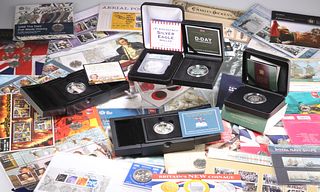 A LARGE COLLECTION OF ROYAL MINT AND OTHER COIN AND STAMP P