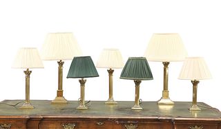 A GROUP OF SEVEN COUNTRY HOUSE BRASS COLUMNAR TABLE LAMPS. 