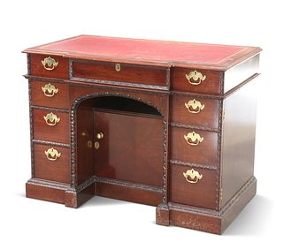 A LIMITED EDITION MAHOGANY KNEEHOLE DESK, in the George II 