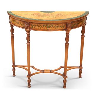 A NEOCLASSICAL STYLE DEMILUNE CONSOLE TABLE, decorated with