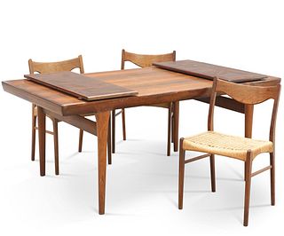 A DANISH ROSEWOOD EXTENDING DINING TABLE AND THREE CHAIRS, 