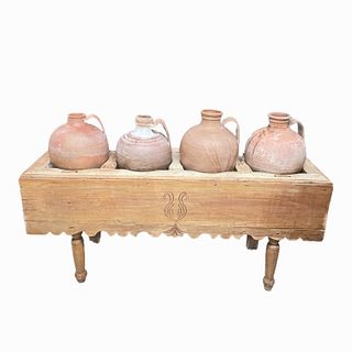 Footed Stand with Four Clay Water Jugs