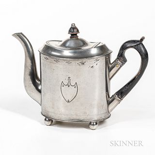 Israel Trask Pewter Teapot, Beverly, Massachusetts, early 19th century, oval body, black-painted wooden handle and finial, shield decor