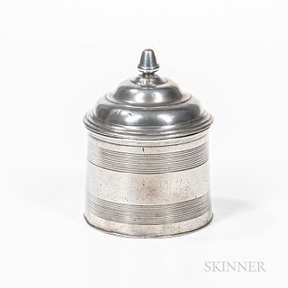 Pewter Tobacco Box, America, 19th century, tapering sides with band decoration, the stepped lid with acorn knop, unmarked, ht. 4 1/2, d
