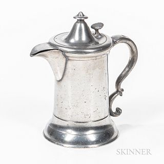 Pewter Syrup Jug, Hall and Cotton, Middletown, Connecticut, 1840s, tapering sides on a wide flaring foot, curved spout, scrolling handl