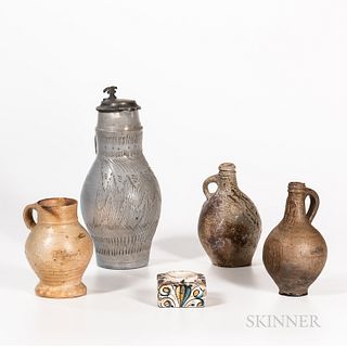 Four European Stoneware Items and a Faience Inkwell, 16th to 18th century, a Raren jug, a sgraffito-decorated stoneware jug with pewter