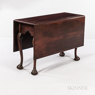 Chippendale Carved Walnut Drop-leaf Dining Table, Pennsylvania, c. 1760-80, the rectangular top on cabriole legs ending in claw-and-bal