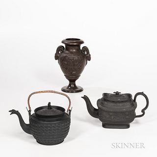 Three Large Matte Glazed English Stoneware Table Items, England, late 18th/early 19th century, a black basalt teapot with molded strawb