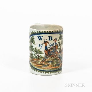 Peacock-decorated Pearlware Half-pint Mug, England, c. 1795, with three peacocks in a natural environment, marked "WB/1795" all within