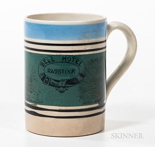 Mocha and Slip-decorated "Bell Hotel" Pint Mug, England, early 20th century, mocha dendrites against a field of blue/green slip bordere