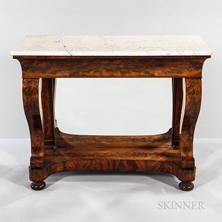 Late Classical Carved Mahogany Marble-top Pier Table, probably Boston, c. 1820-30, the marble top with rounded edge above a deeply mold
