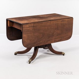 Classical Carved Mahogany Drop-leaf Table, Boston, c. 1820, the rectangular top with reeded edge and rounded drop leaves, above a strai