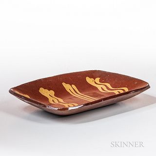 Slip-decorated Redware Loaf Pan, Norwalk, Connecticut, c. 1830-50, rectangular pan with rounded corners with straight and wavy line yel