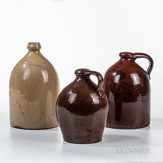 Three Glazed Redware Jugs, New York and Connecticut, 19th century, a Norwalk manganese-splotched straight-sided jar; a redware jug attr