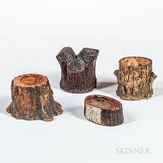 Four Redware Tree Stump-form Items, 19th century, a bank, a match holder, a small planter, and a salt, ht. to 3 3/4 in.