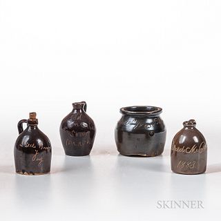Four Miniature Inscribed Pottery Pieces, 19th century, three jugs inscribed "Mildred M. Putnam/1883," "Old Continental Sour Mash," and