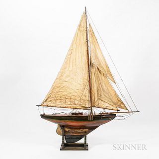Handmade Pond Boat, early 20th century, the single-masted vessel apparently complete with intact rigging, sails, deck fixtures, rudder,