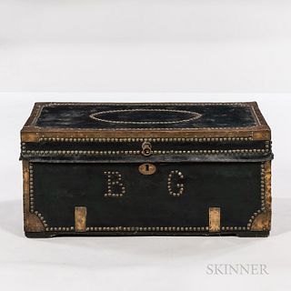 Camphorwood Trunk, China, first half 19th century, the brass-bound trunk with black-leather and brass tack exterior initialed "BG," bra