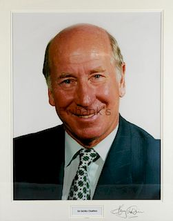Sir Bobby Charlton, Former Manchester United & England Footballer, coloured photograph signed on the