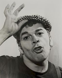 Ian Dury (And The Blockheads) 9 black & white photographs by Harry Goodwin, mostly informal, stamped