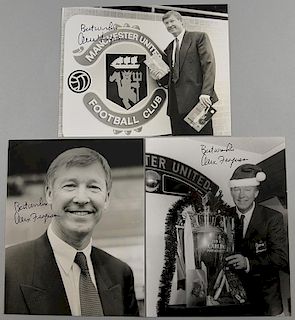 Three signed photographs of Sir Alex Ferguson, one showing Sir Alex Ferguson with the Premiership Tr