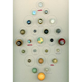 A FULL CARD OF ASSORTED MATERIAL BALL BUTTONS