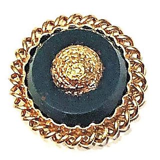 A DIVISION ONE GEMSTONE BUTTON SET IN GOLD
