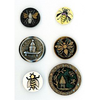 A SMALL CARD OF ASSORTED MATERIAL BEE BUTTONS