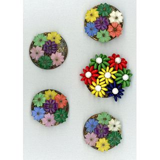 A SMALL CARD OF CELLULOID FLOWER HEAD BUTTONS