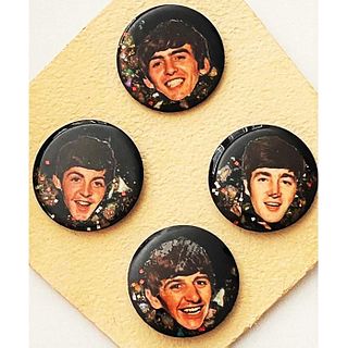 A SET OF DIVISION THREE BUTTONS OF THE BEATLES