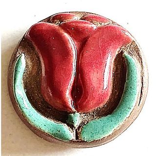 A DIVISION 3 POTTERY BUTTON FROM THE SAMMOTH COMPANY.