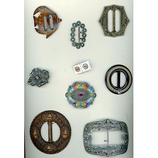 A CARD OF ASSORTED BUCKLES INCLUDING STEEL