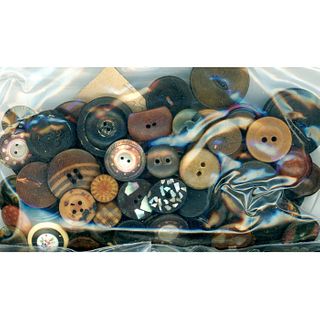 A BAG LOT OF EARTH TONE MATERIAL BUTTONS