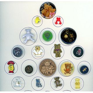 A SMALL CARD OF ASSORTED MATERIAL TEDDY BEAR BUTTONS