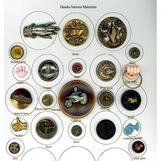 A FULL CARD OF ASSORTED MATERIAL HAND BUTTONS
