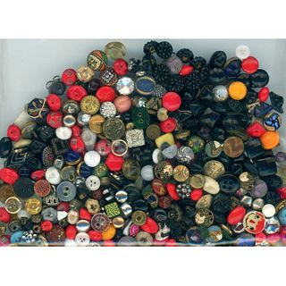 A BAG LOT OF ASSORTED DIMINUTIVE SIZE BUTTONS