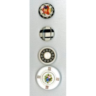 A SMALL CARD OF WHITE GLASS BUTTONS