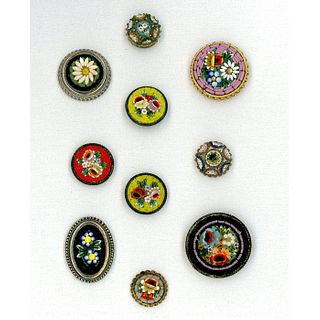 A SMALL CARD OF EARLY 20TH C. MOSAICS IN METAL BUTTONS