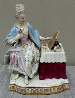 MEISSEN. Porcelain Figure of a Woman at a Vanity.