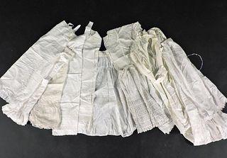 A large collection of 19th century cotton petticoats