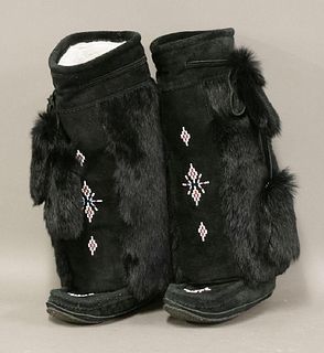 A pair of Redvers SK women's black mukluk boots