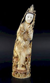 20th century Chinese carving of Guanyin seated on a lotus throne wearing a long robe, four character