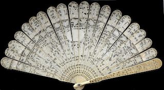 19th century Chinese ivory fan carved with figures at various pursuits and flowers and foliage, each